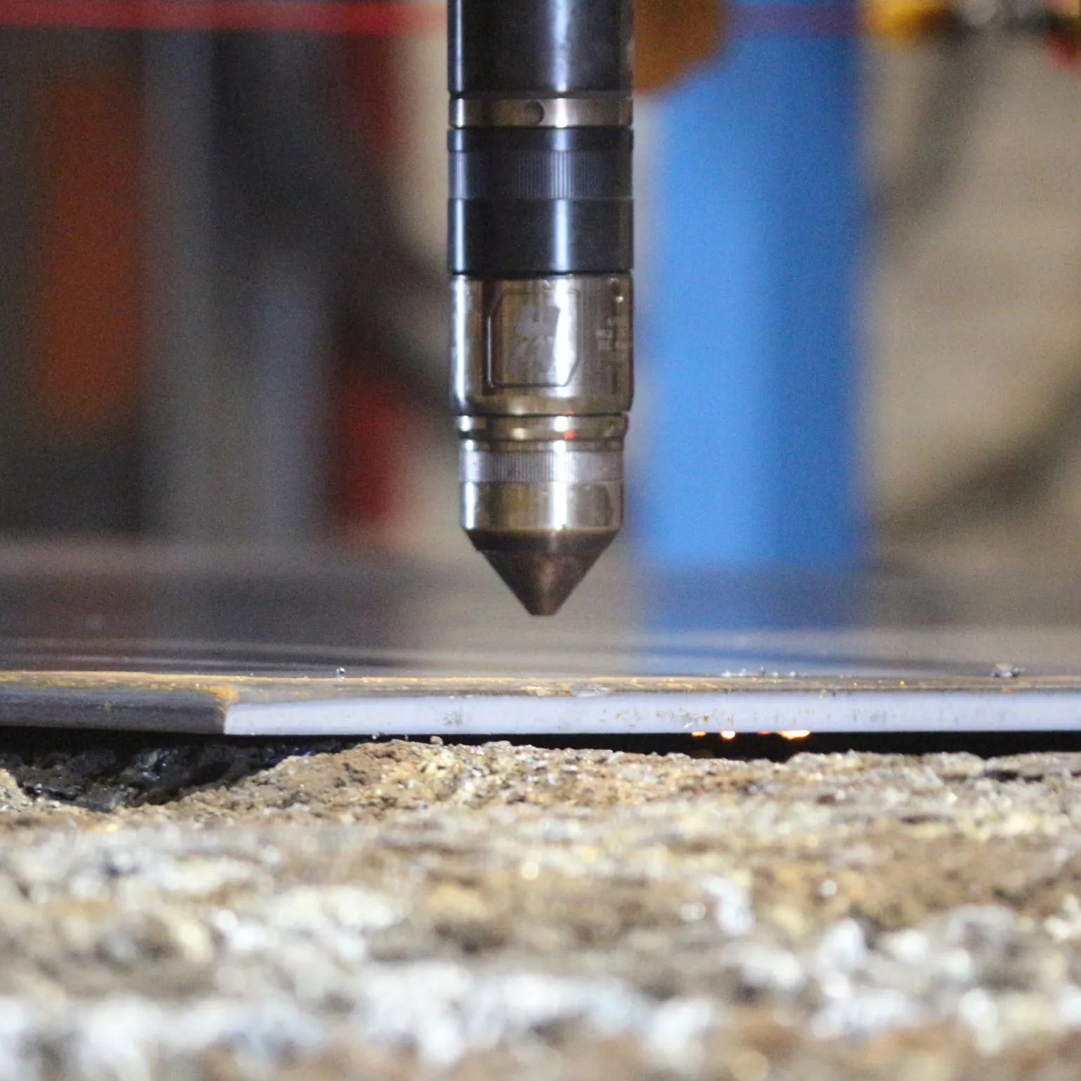 What is plasma cutting?

Plasma cutting involves the use of super-heated ionised has streams which can reach temperatures of up to 40,000°F to cut metal. Plasma cutting tools use electrically charged gases like nitrogen or compressed air, which are forced through a nozzle to create a concentrated plasma arc ideal for cutting metal.

The heat generated by these tools rapidly melt metals along their cutting lines, while the gas jet produced also expels molten metal, creating clean and precise cuts.
