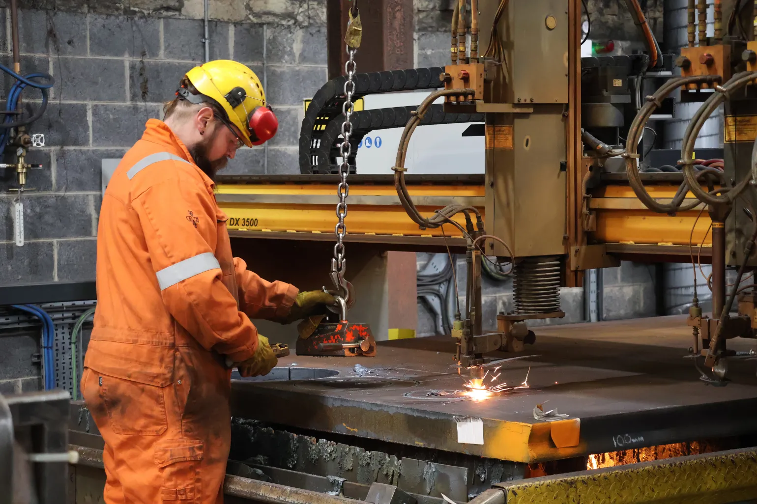 At Pulmans, we use 2 ESAB Combirex's for our flame profiling service. This machine is packed with features that set it apart from other machines used for flame cut steel profiles. These features include:


	High precision cutting: Advanced CNC controls ensure precise cutting with minimal deviation.
	Multi-torch capability: The ability to use multiple cutting torches at the same time increases productivity for large-scale projects.
	Automated processes: By not requiring much manual intervention, this machine offers greater efficiency and consistency.
	Thick plate handling: The ESAB Combirex can cut steel plates up to several centimetres thick, making it ideal for heavy-duty industrial applications.
	Durability: Built for high workloads with minimal downtime, this flame profiling machine ensures reliable performance over time.

