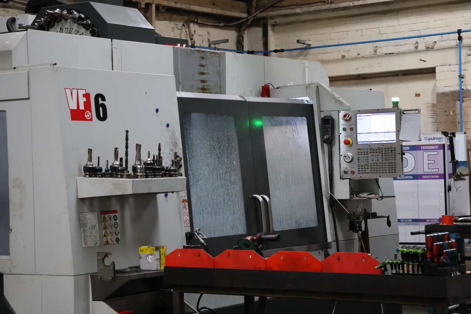 The Haas VF6/40 vertical machining centre is a superb choice for large projects that require extensive surface area. Equipped with a 24-tool system and a substantial 1620mm x 711mm working surface, this machine service centre offers unmatched capacity and flexibility for heavy-duty tasks.
The key features of the Haas VF6/40 include:


	A highly efficient 24-tool automatic tool changer.
	1620mm x 711mm working surface.
	Superior performance on large-scale components.
	Durable and reliable.


Whether you require custom metal parts or large steel sections machined to precise specifications, the Haas VF6/40 delivers consistent performance and unbeatable quality.
