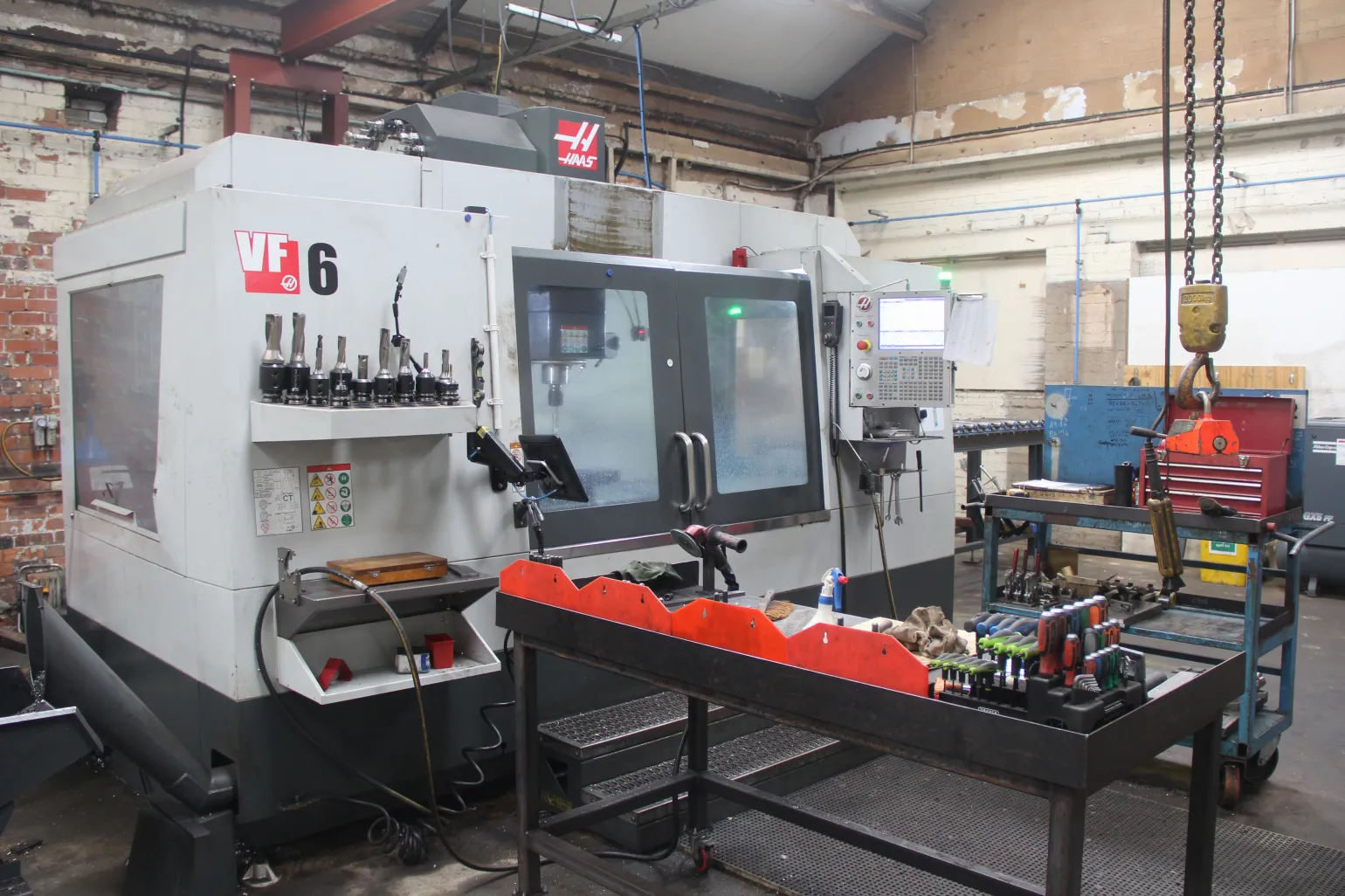 The Haas VF6/40 vertical machining centre is a superb choice for large projects that require extensive surface area. Equipped with a 24-tool system and a substantial 1620mm x 711mm working surface, this machine service centre offers unmatched capacity and flexibility for heavy-duty tasks.
The key features of the Haas VF6/40 include:


	A highly efficient 24-tool automatic tool changer.
	1620mm x 711mm working surface.
	Superior performance on large-scale components.
	Durable and reliable.


Whether you require custom metal parts or large steel sections machined to precise specifications, the Haas VF6/40 delivers consistent performance and unbeatable quality.
